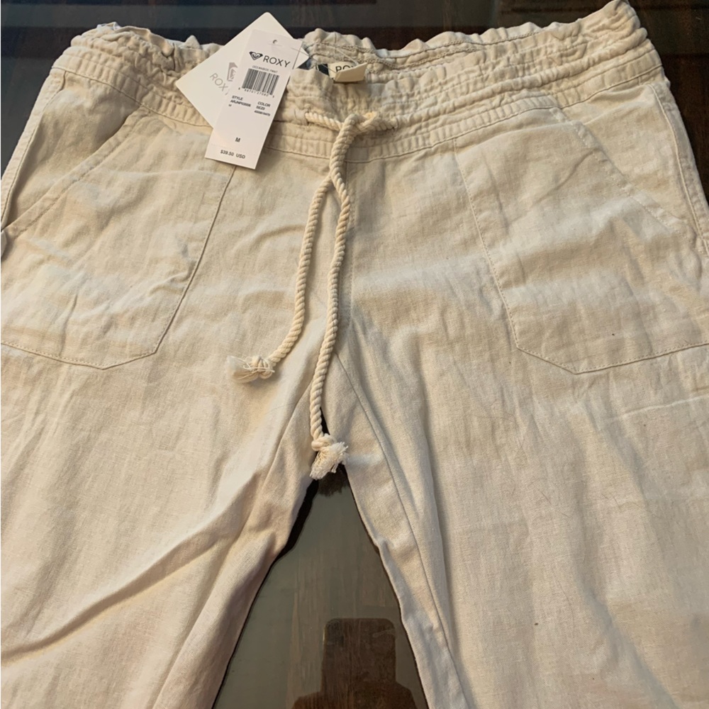 ROXY Size medium cream colored cotton pants .  New with tags